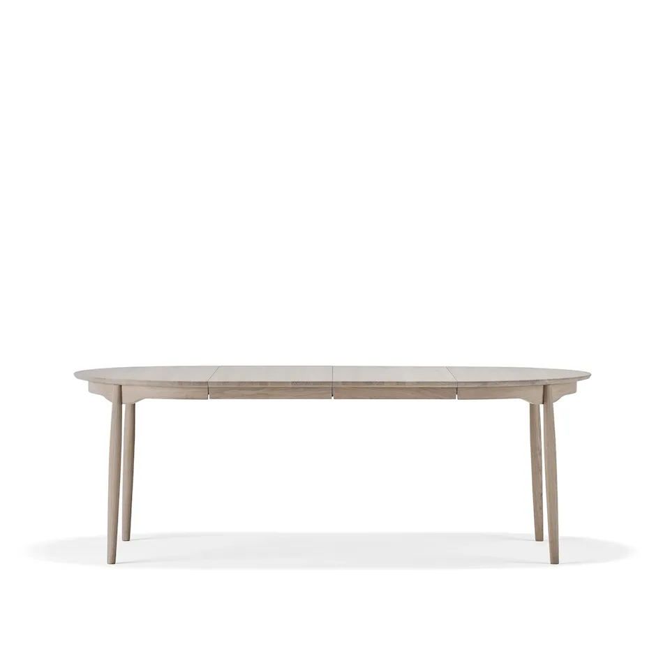 Carl spisebord Ø115 cm med ileggsplate